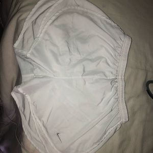 white nike running shorts